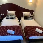 Les Commercants Hotell