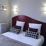 Les Commercants Hotell