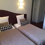 Les Commercants Hotell