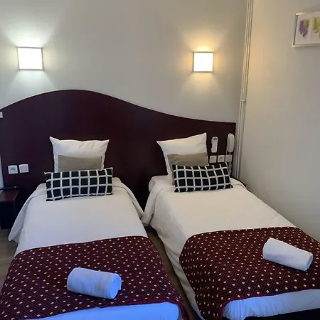 Les Commercants Hotell